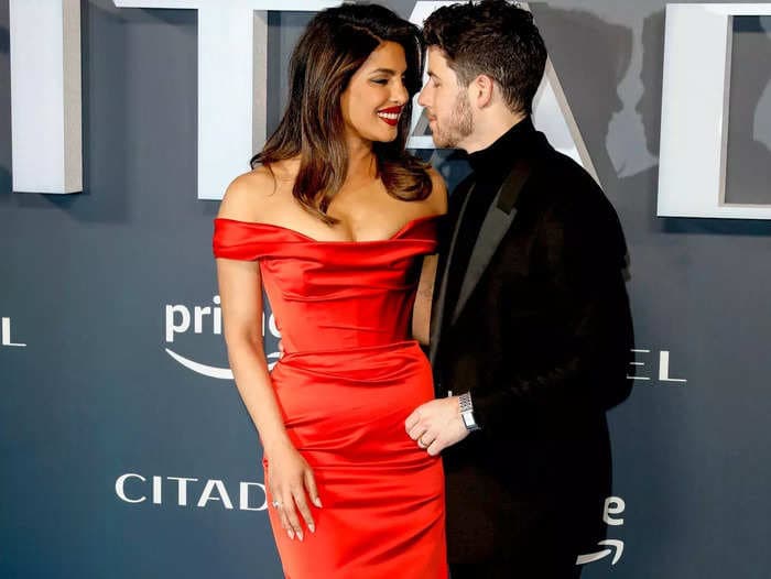 Nick Jonas applauded a daring red dress Priyanka Chopra wore to a premiere by poking fun at a Jonas Brothers song