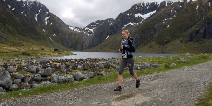 An elite runner was disqualified from an ultramarathon after she was caught using a car for part of the race