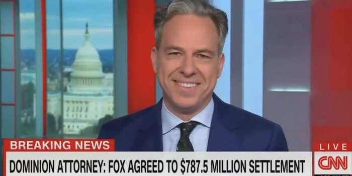 CNN host bursts out laughing as he reads Fox News' $787.5 million Dominion settlement