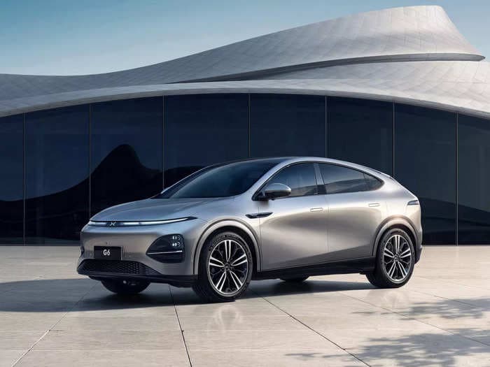 Chinese Tesla rival XPeng revealed a sleek, quick-charging SUV with more range than the Model Y &mdash; see the G6