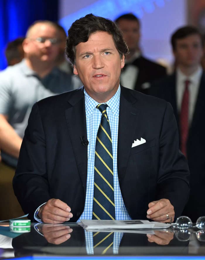 Top Kremlin propagandist tells Tucker Carlson he should run for president and 'You are always welcome in Russia and Moscow'