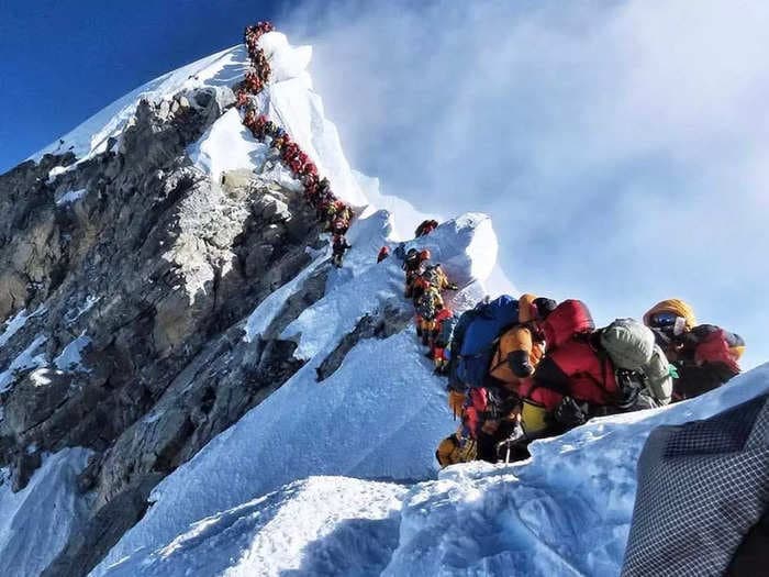 Nepal has granted a record number of permits to climb Everest despite potential for traffic jams in the so-called 'death zone'