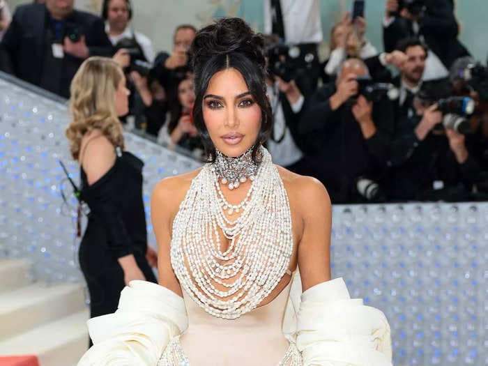 Kim Kardashian returned to the Met Gala dripping in pearls from head to toe