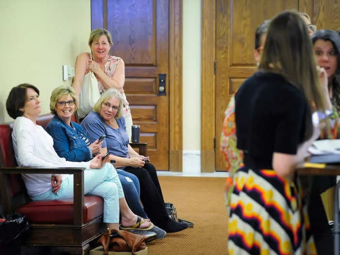 A photo of women snickering at trans lawmaker Zooey Zephyr in Montana looks a lot like the photos of white people snickering at Black people in the 1950s
