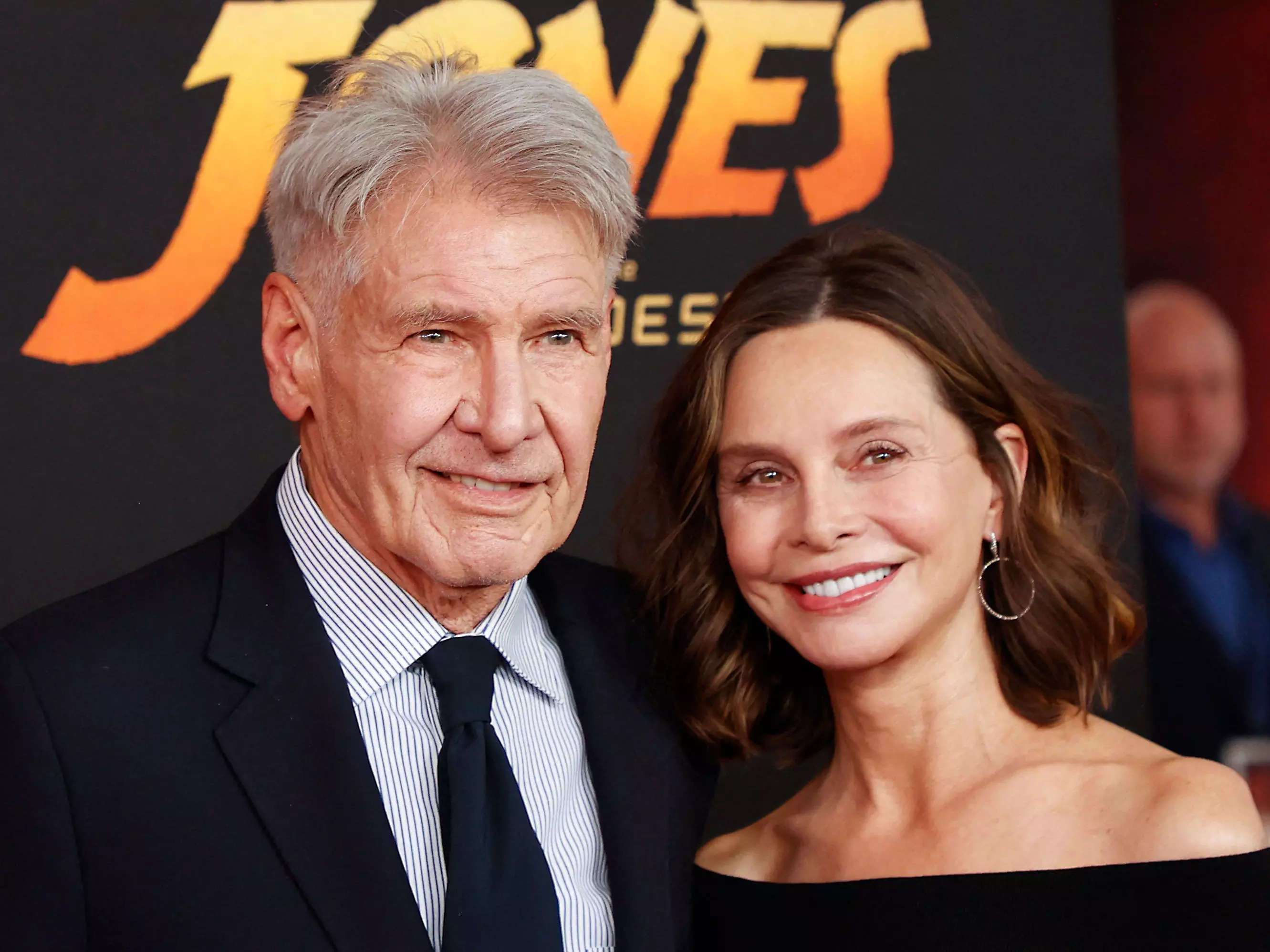 Harrison Ford and Calista Flockhart hold hands during red-carpet date