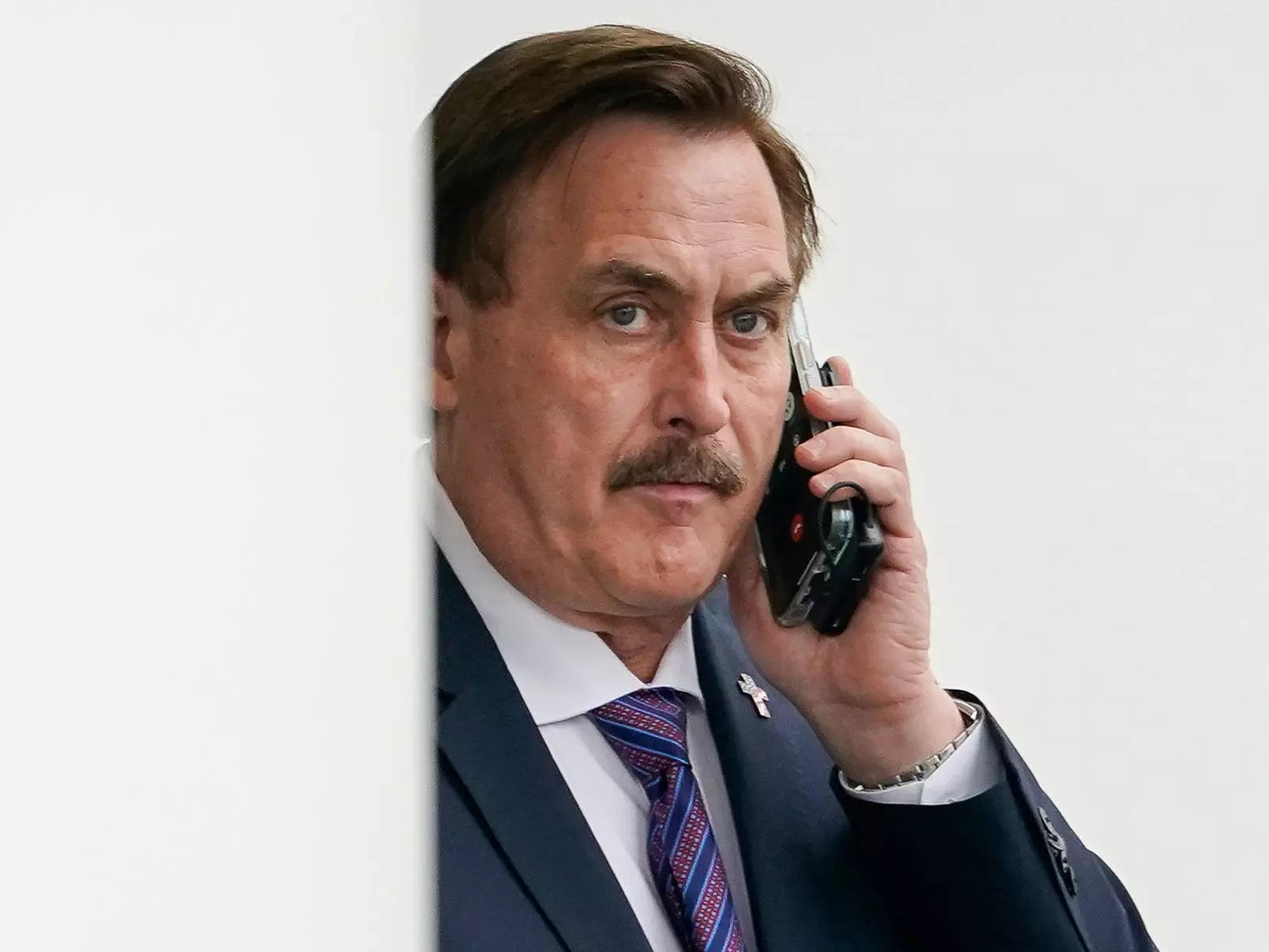 Mike Lindell is auctioning off pillowmaking equipment and hawking