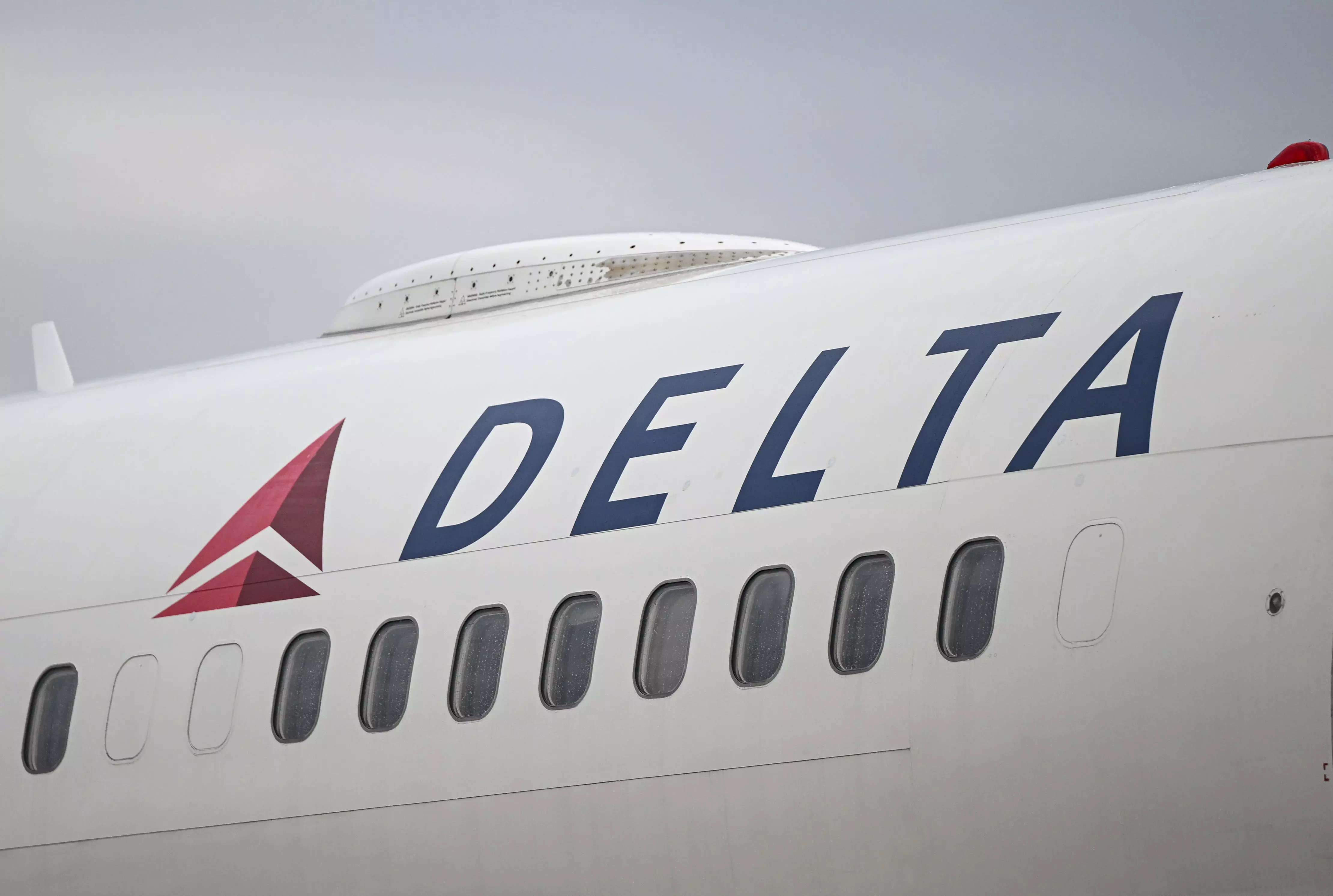 A Delta plane turned around midair after an anonymous caller told