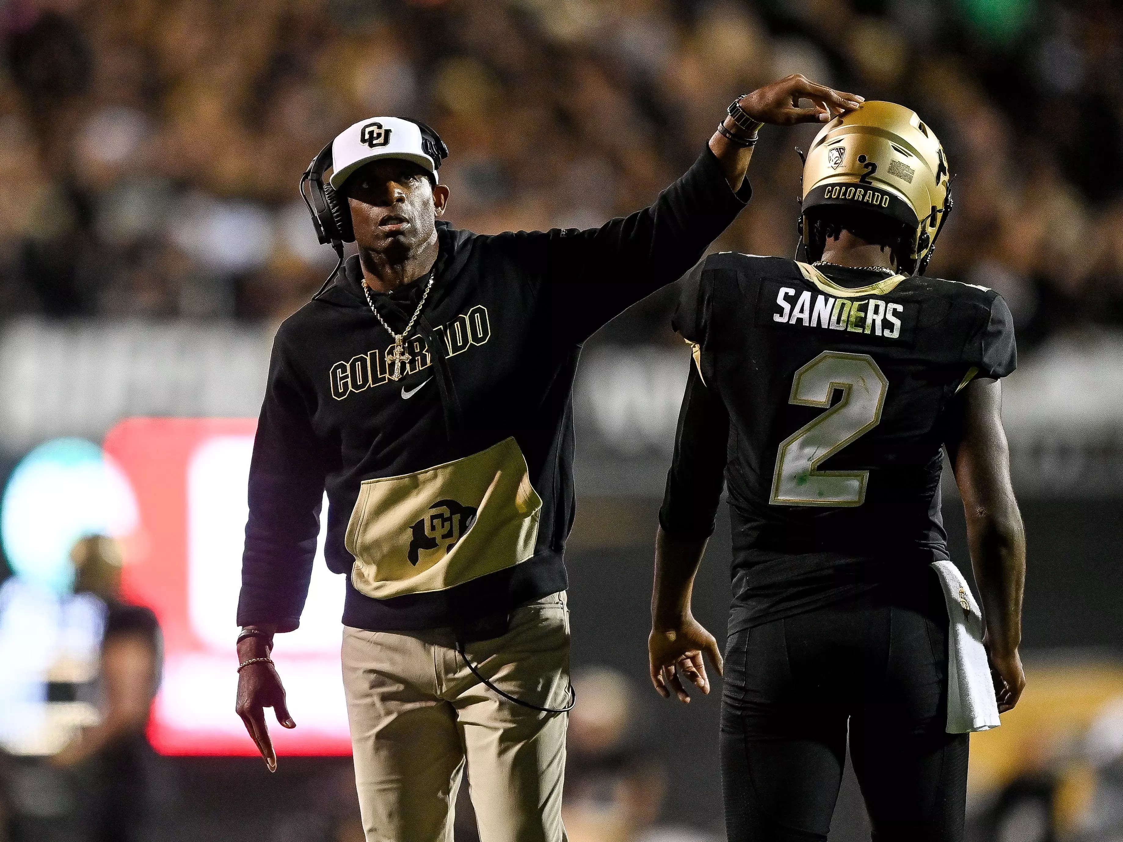 Deion Sanders Says 'Family Makes Us Stronger' on Set of Super Bowl Ad