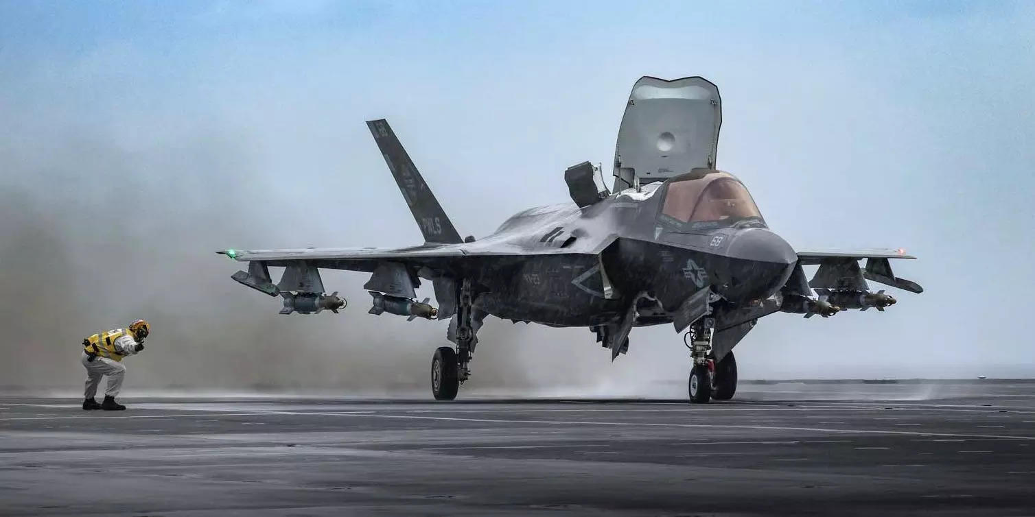 The British navy's newest aircraft carrier teamed up with US pilots to ...