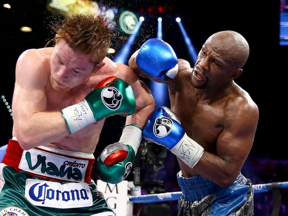 Mayweather wins majority decision vs. Alvarez