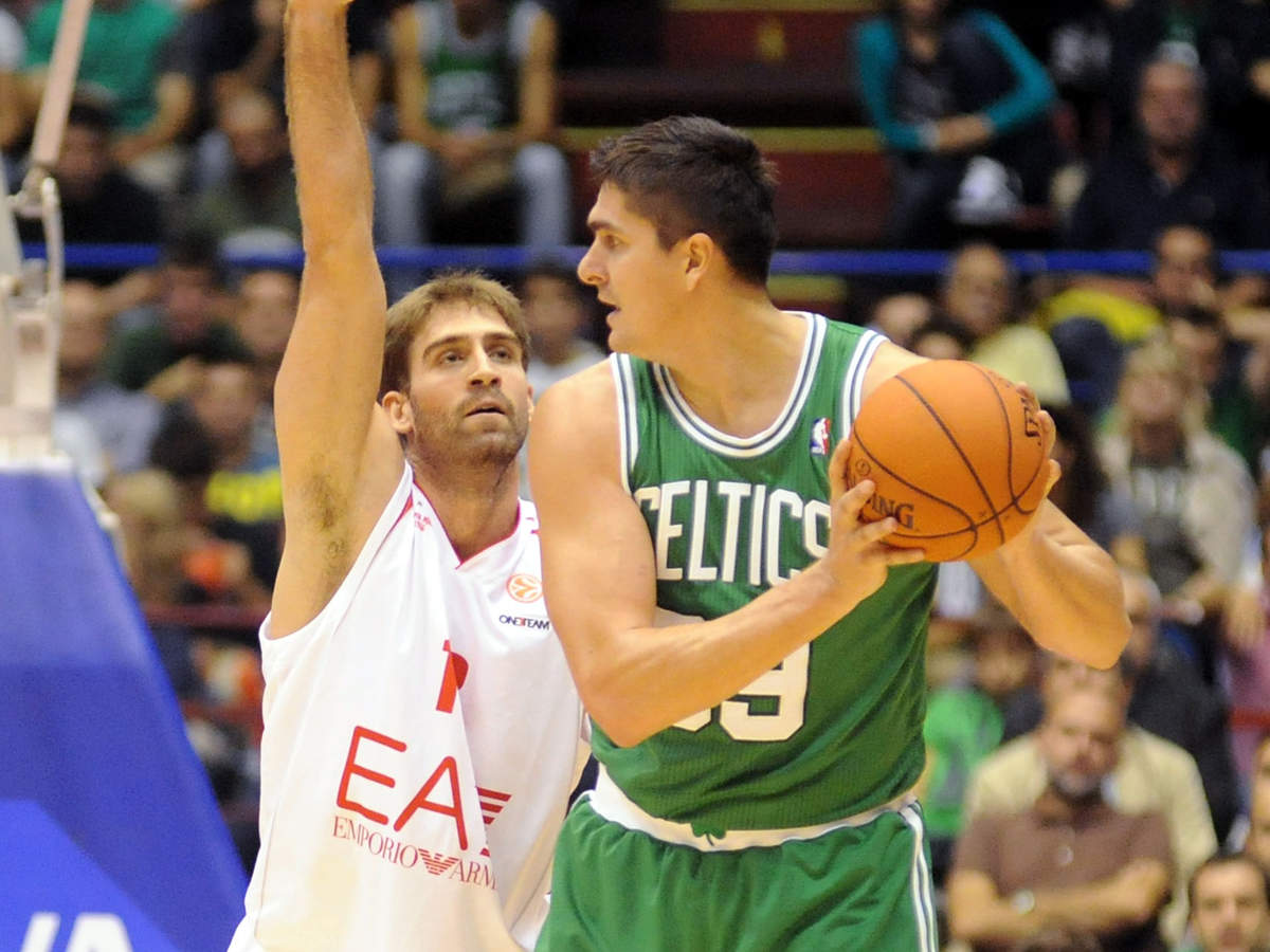 Serbia and Montenegro's Darko Milicic, left, of the NBA's Orlando