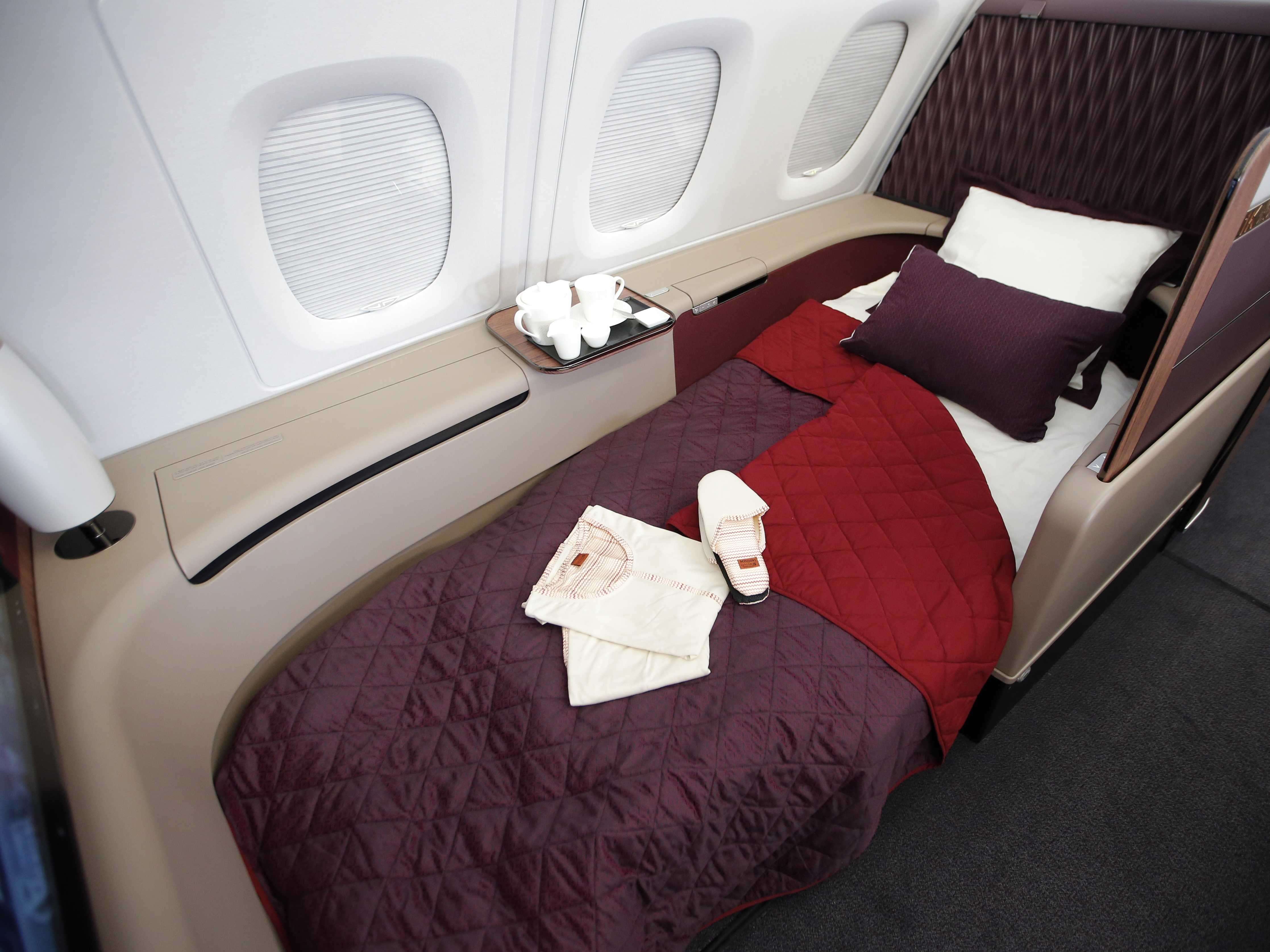 First Class Seats Can Be Flattened Into Actual Beds, So It's Easy To 