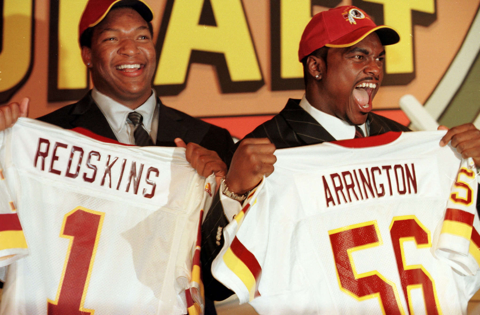 linebacker LaVar Arrington, of Penn State, holds up a Washington Redskins  jersey after the Redskins selected him as the team's No. 1 pick, second  overall, in the NFL draft Saturday, April 15