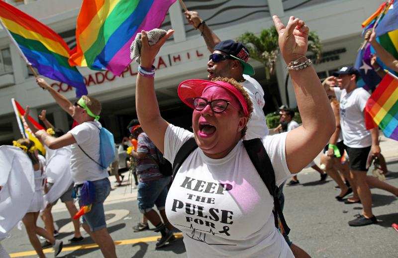 Participants at the gay pride parade in San Juan, Puerto Rico, also