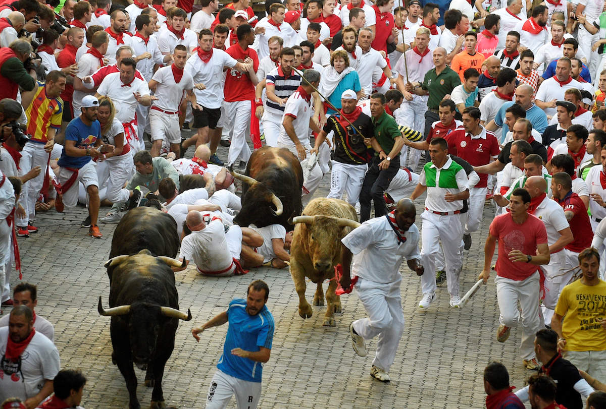 San Fermin Festivities. Typical Scene Of The Street During The San Fermin.  The Red Scarf Is A Distinctive Element. Pamplona, Spain. Stock Photo,  Picture and Royalty Free Image. Image 14667841.