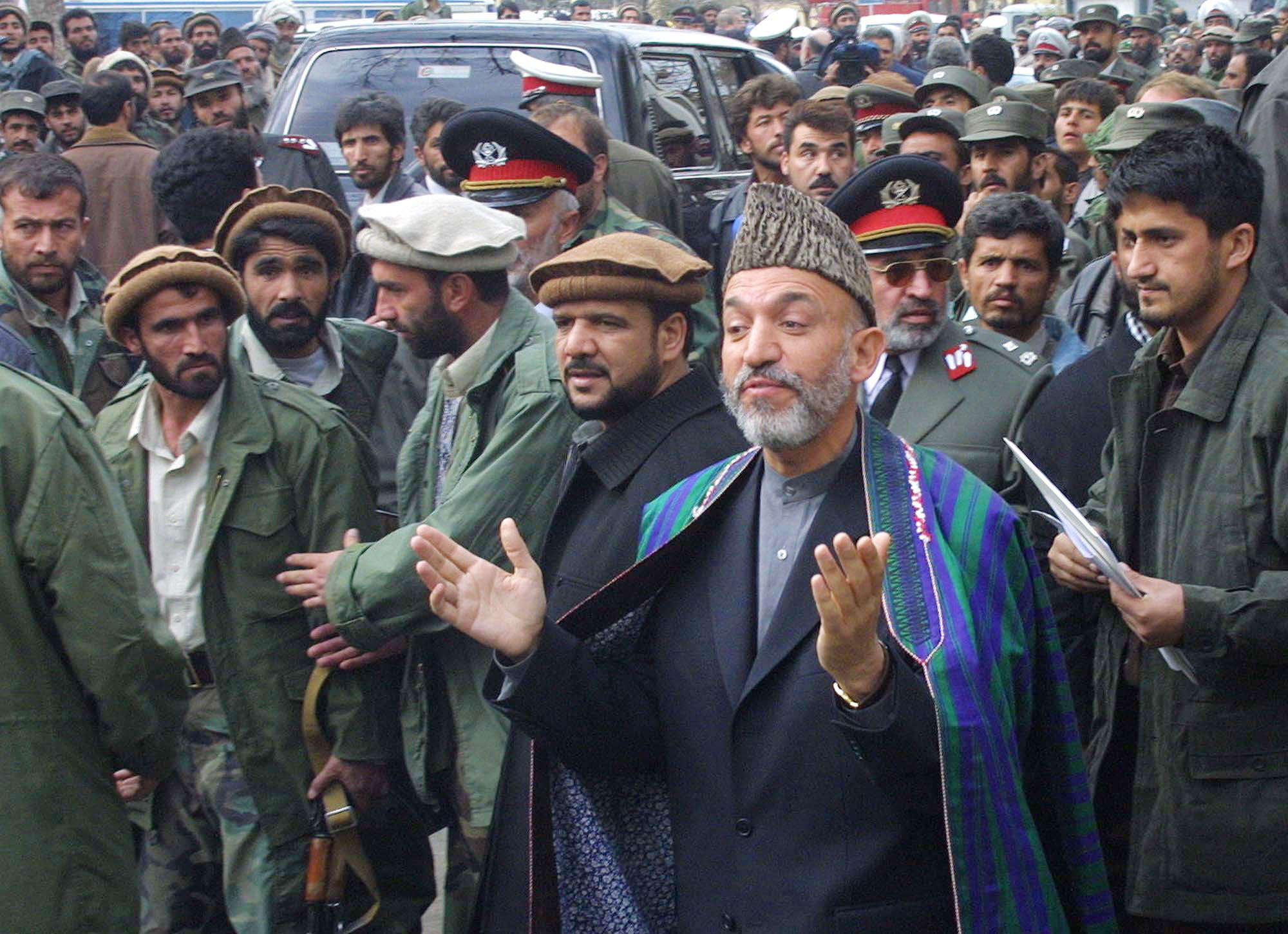 an-interim-government-was-formed-by-late-december-2001-hamid-karzai