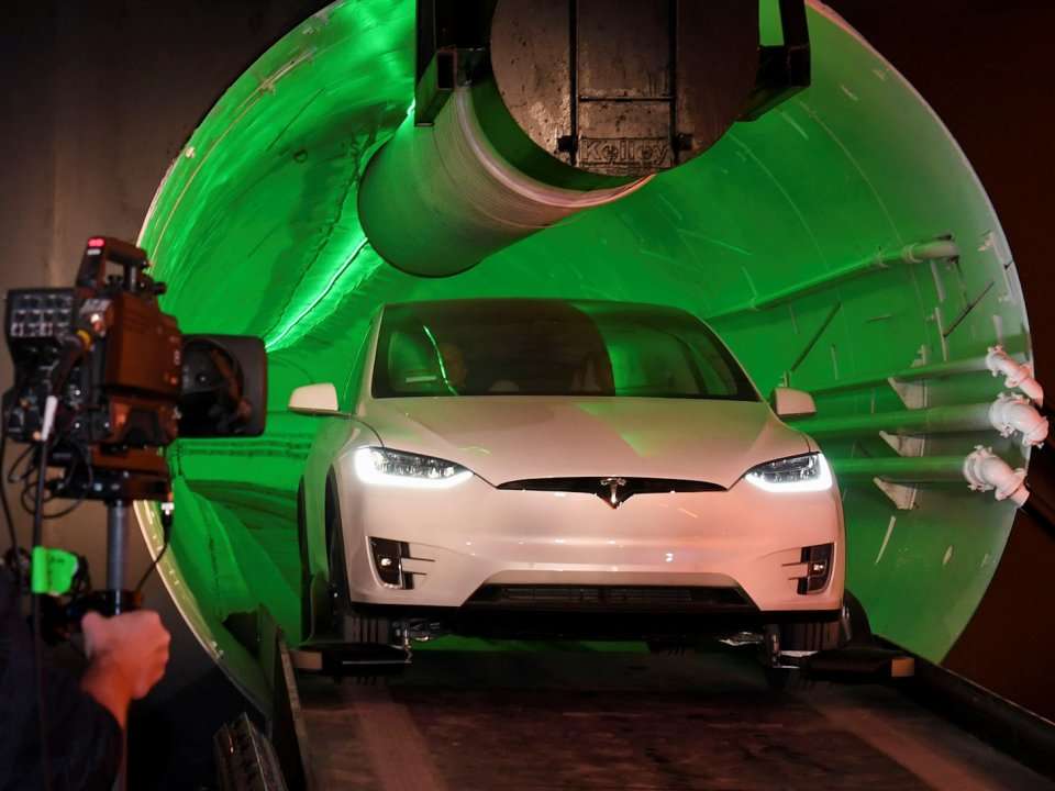 Watch A Tesla Rocket Through Elon Musks New Neon Lit Boring Company