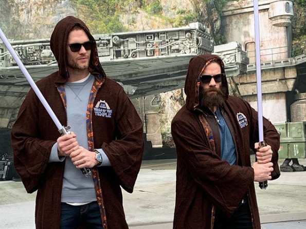 Tom Brady and Julian Edelman fought with lightsabers at Disney World after  their Super Bowl win