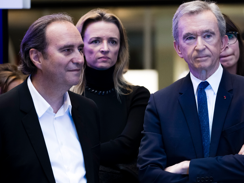 The chairman and CEO of the French conglomerate LVMH Moet Hennessy Louis  Vuitton SA Bernard Arnault (M) and his son Antoine Arnault (L) walks out  the Stock Photo - Alamy