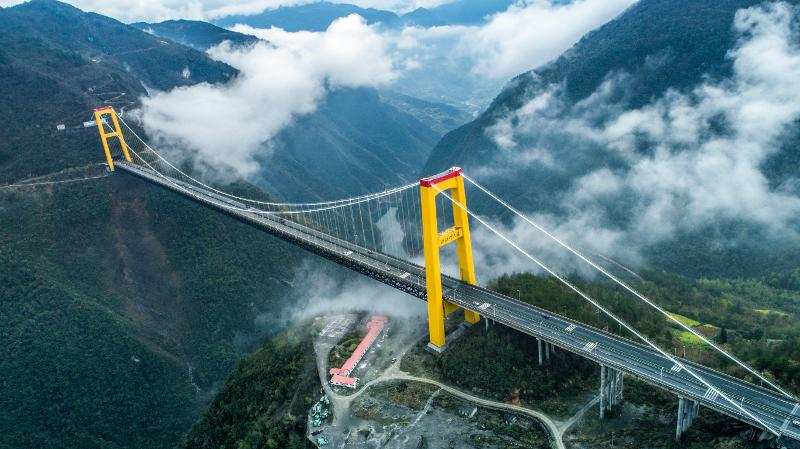 Construction workers had to use a rocket to build the suspension cable ...