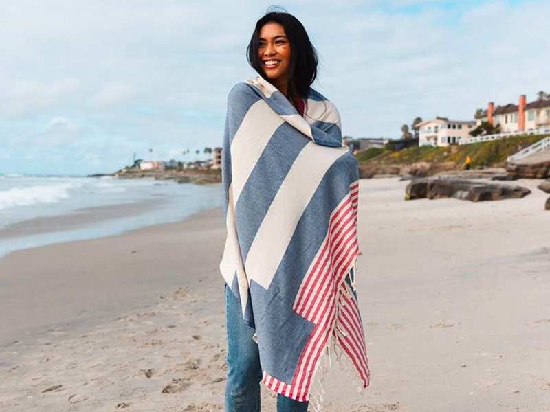 This beach towel company has done $20 million in sales after an appearance  on 'Shark Tank' - and donates 10% of profits to help save marine life
