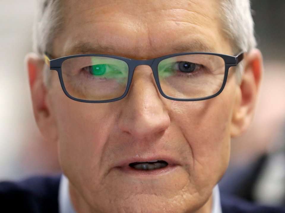 Apple CEO Tim Cook took a chairman position at one of China's top