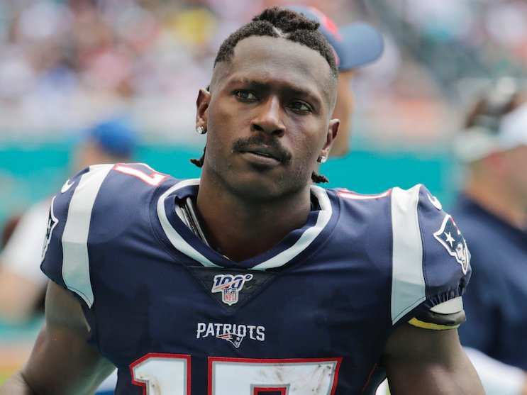 Police say Antonio Brown has locked himself in his home after an