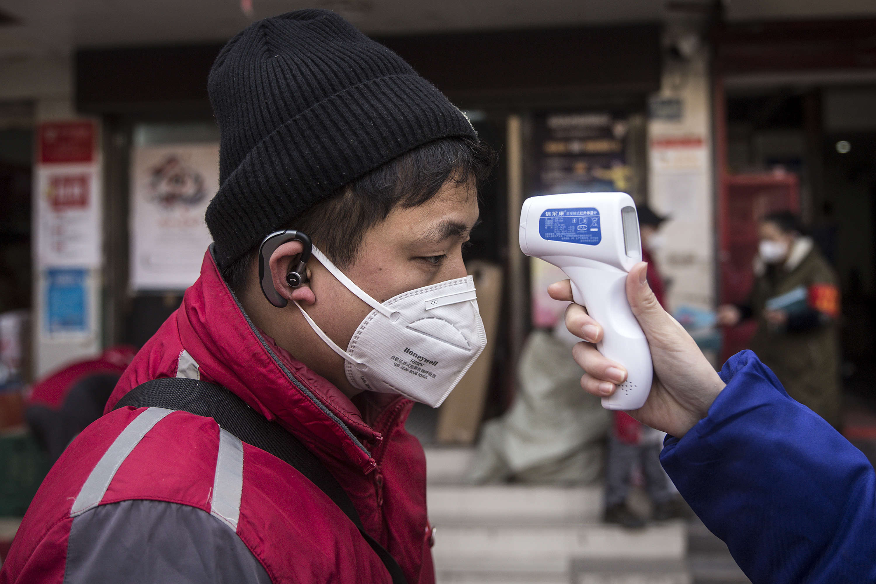 Community Workers Check The Temperature Of The Couriers Frequently 