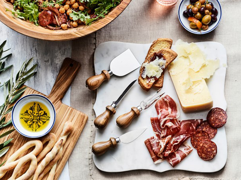 https://www.businessinsider.in/photo/74106535/A-set-of-olive-wood-cheese-knives.jpg