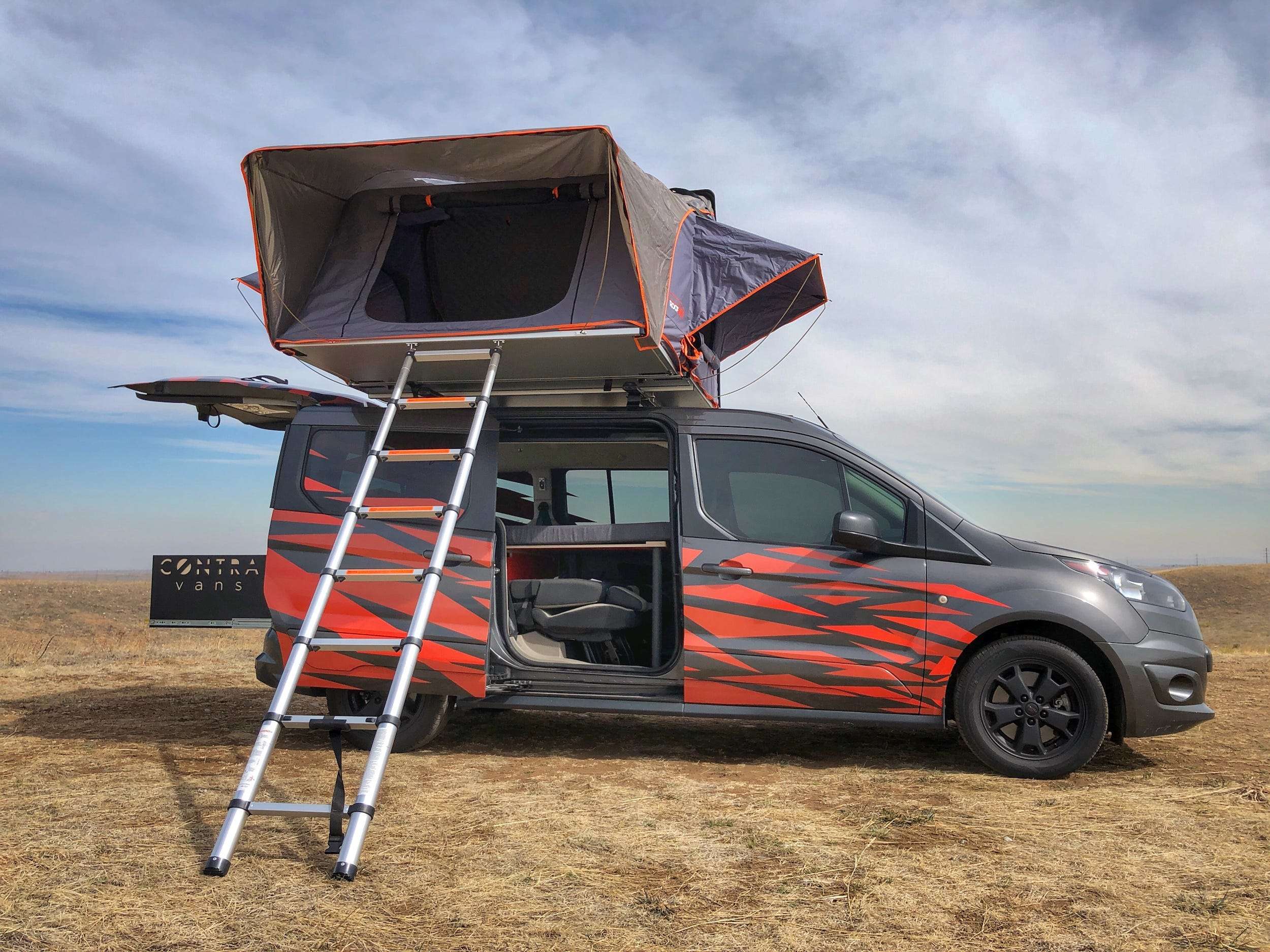 This tiny, $15,000 camper van conversion sleeps 5 people and fits in ...