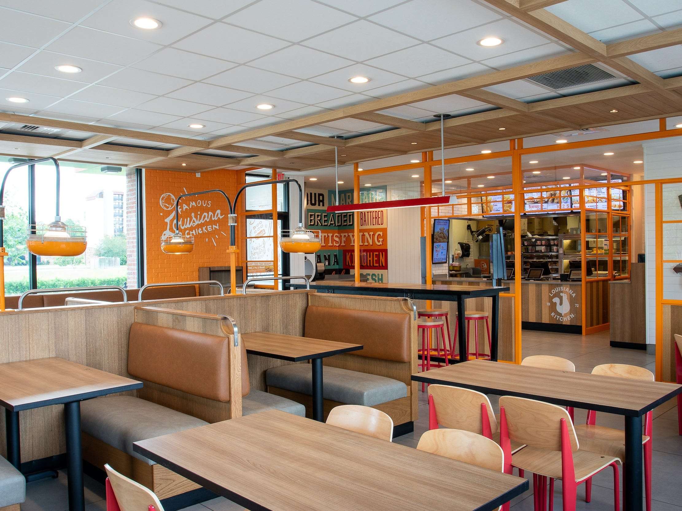 Popeyes revamps its logo and restaurant design as it sets its sights on 