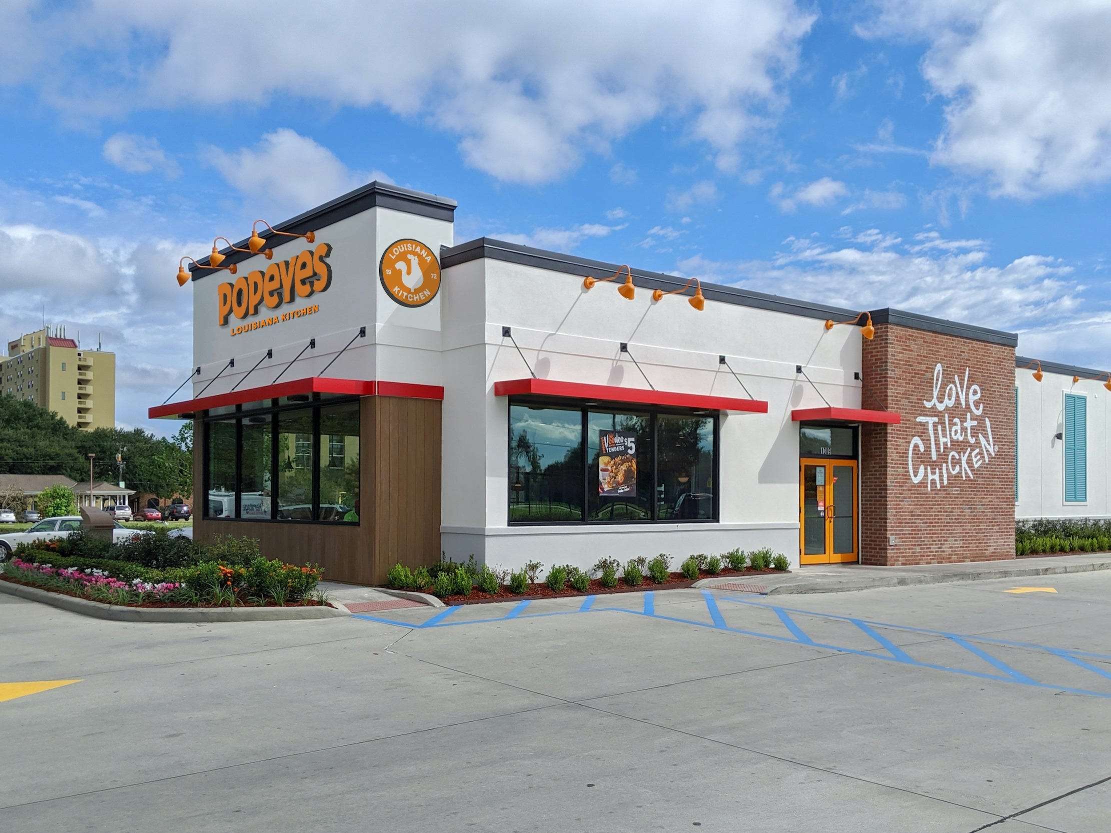 Popeyes revamps its logo and restaurant design as it sets its sights on
