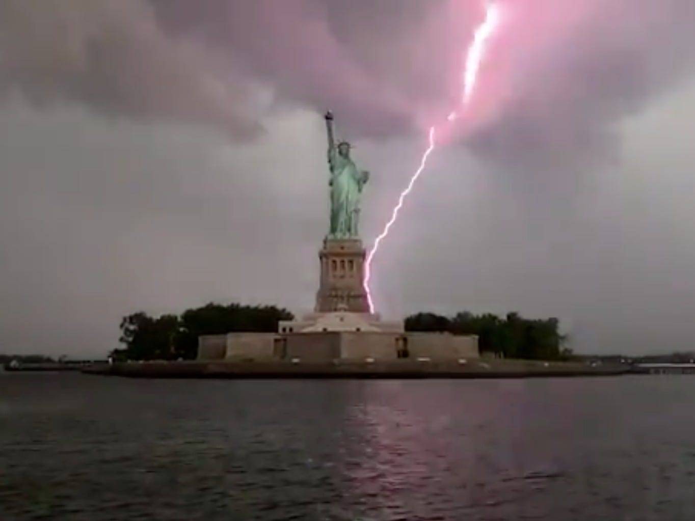 A stunning video shows the Statue of Liberty being struck by lightning