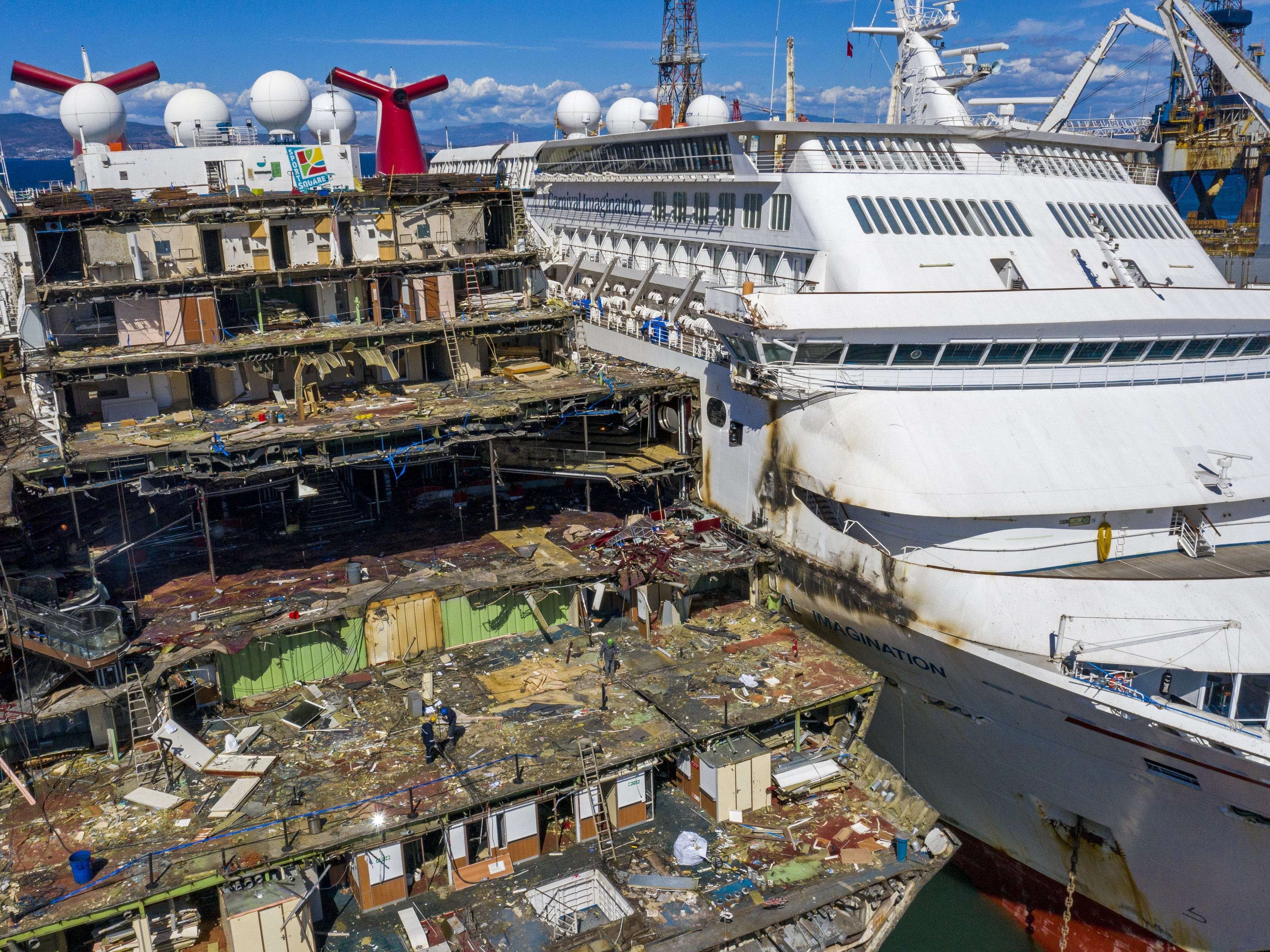 Photos of abandoned, stripped cruise ships show how deeply the cruise
