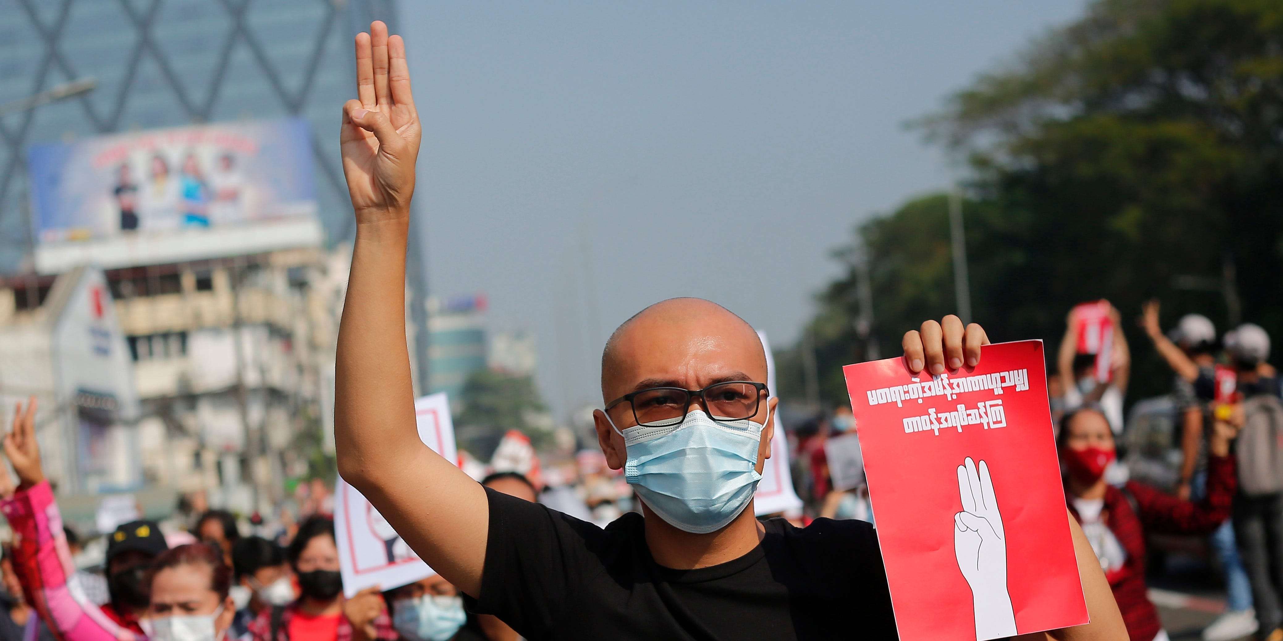 protesters-in-myanmar-are-using-the-three-finger-salute-from-the