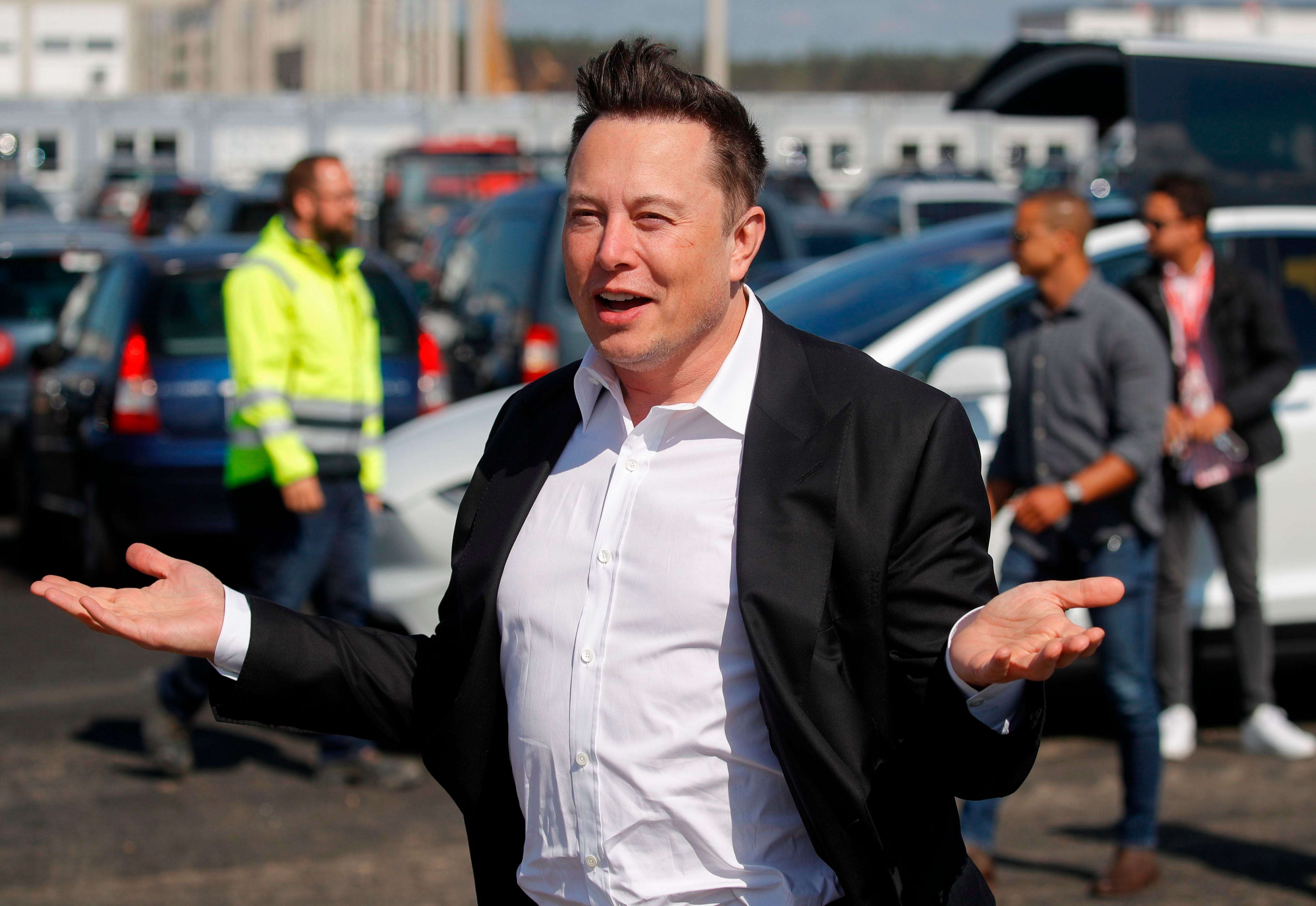 business insider tesla bitcoins