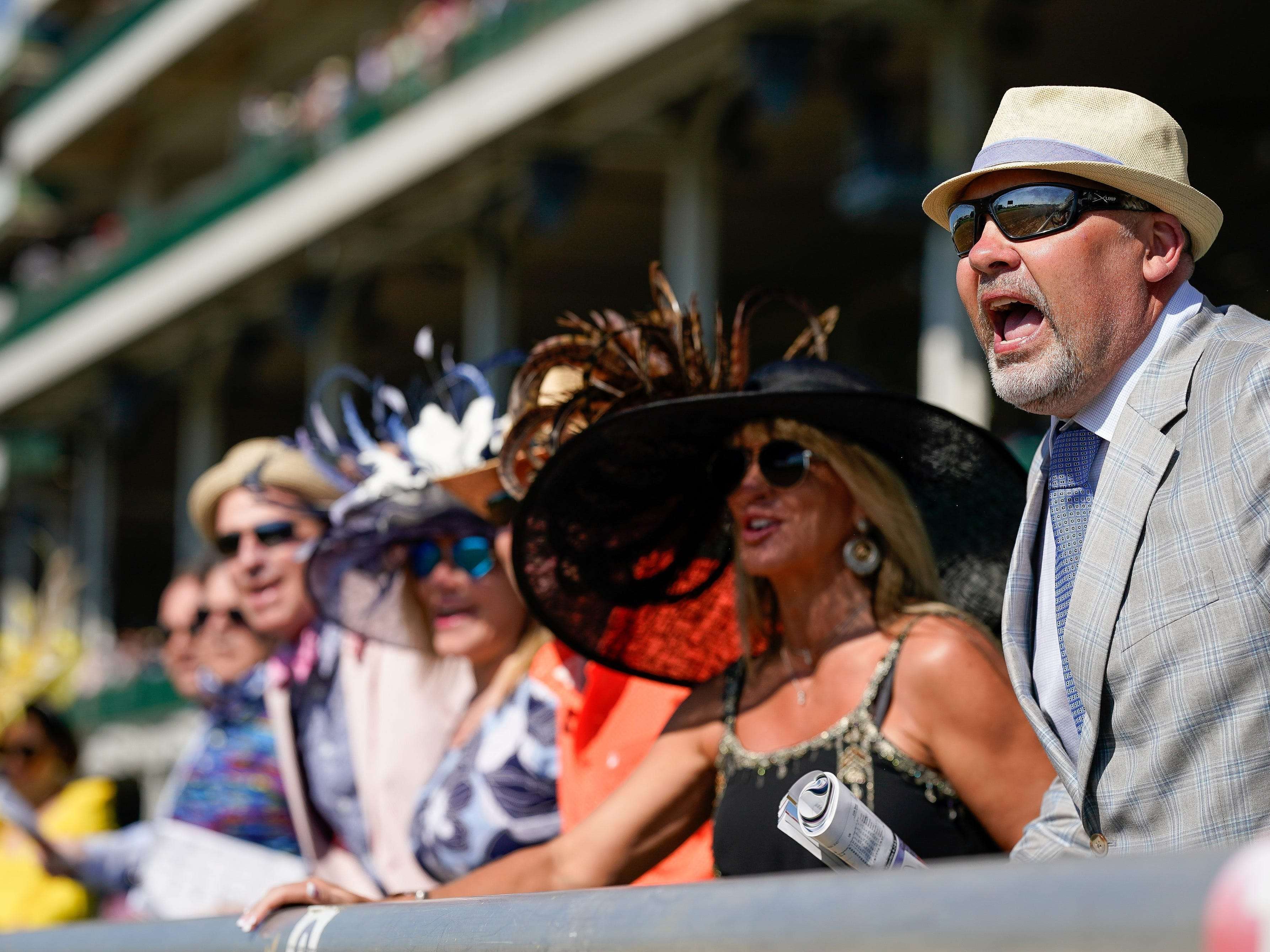 Photos of the Kentucky Derby show that the 'most exciting 2 minutes in