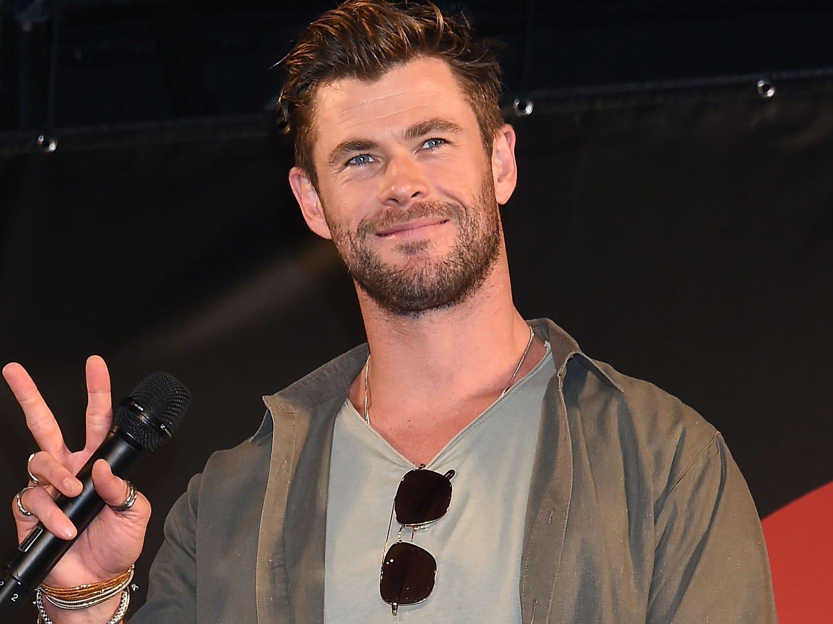 Chris Hemsworth celebrates the end of filming 'Thor 4' by flexing his