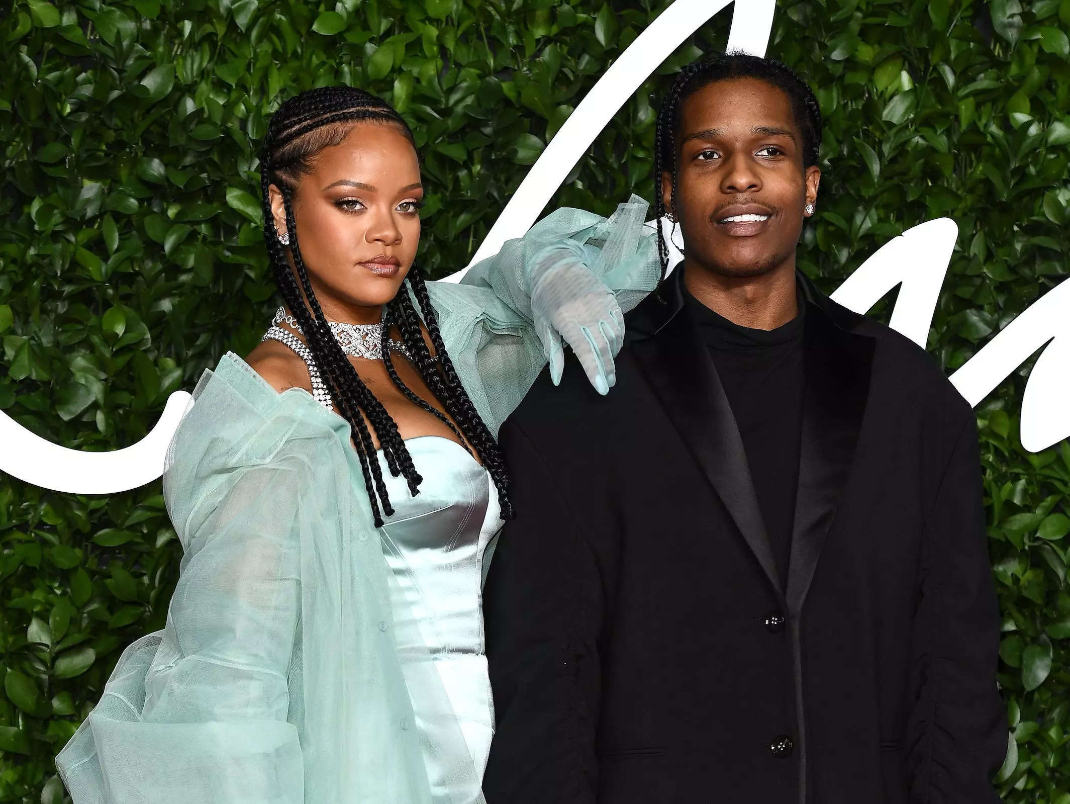 Rihanna and boyfriend A$AP Rocky share a kiss before jumping on a jet ski  during romantic getaway in her native Barbados