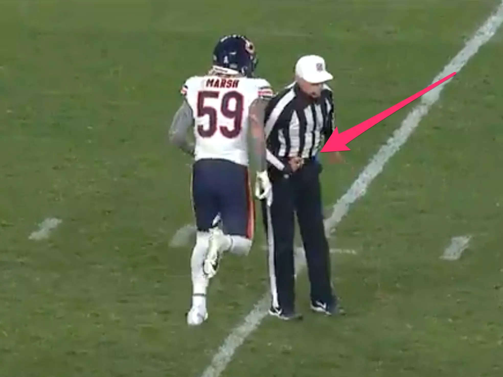 NFL referee appeared to hip-check a player just before throwing