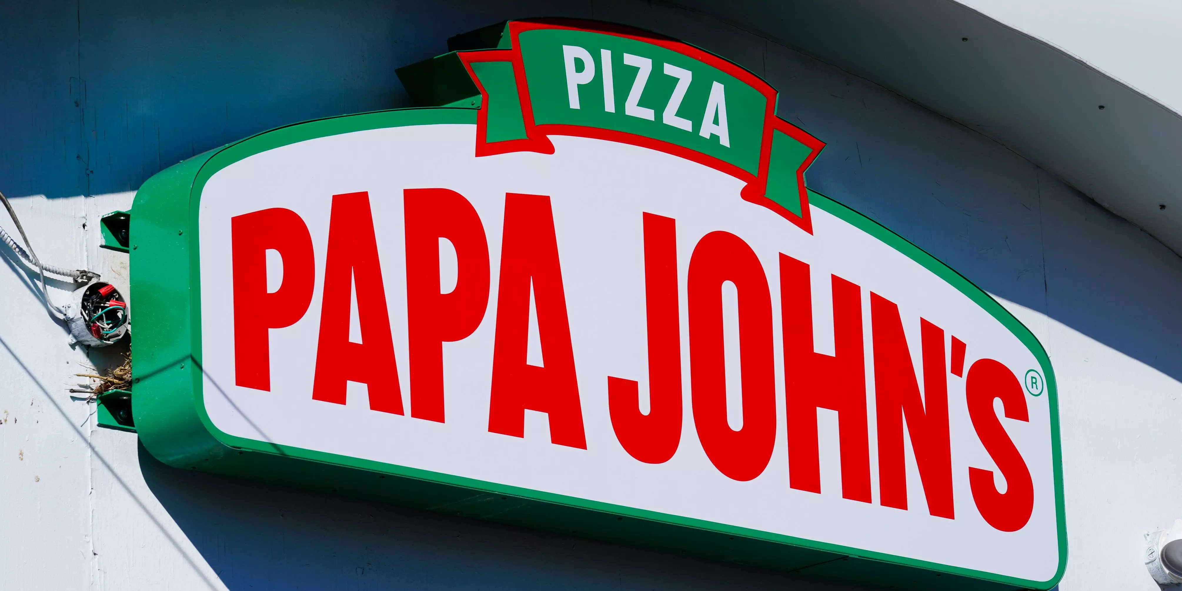 A Papa John's restaurant manager says he was fired after 13 years with