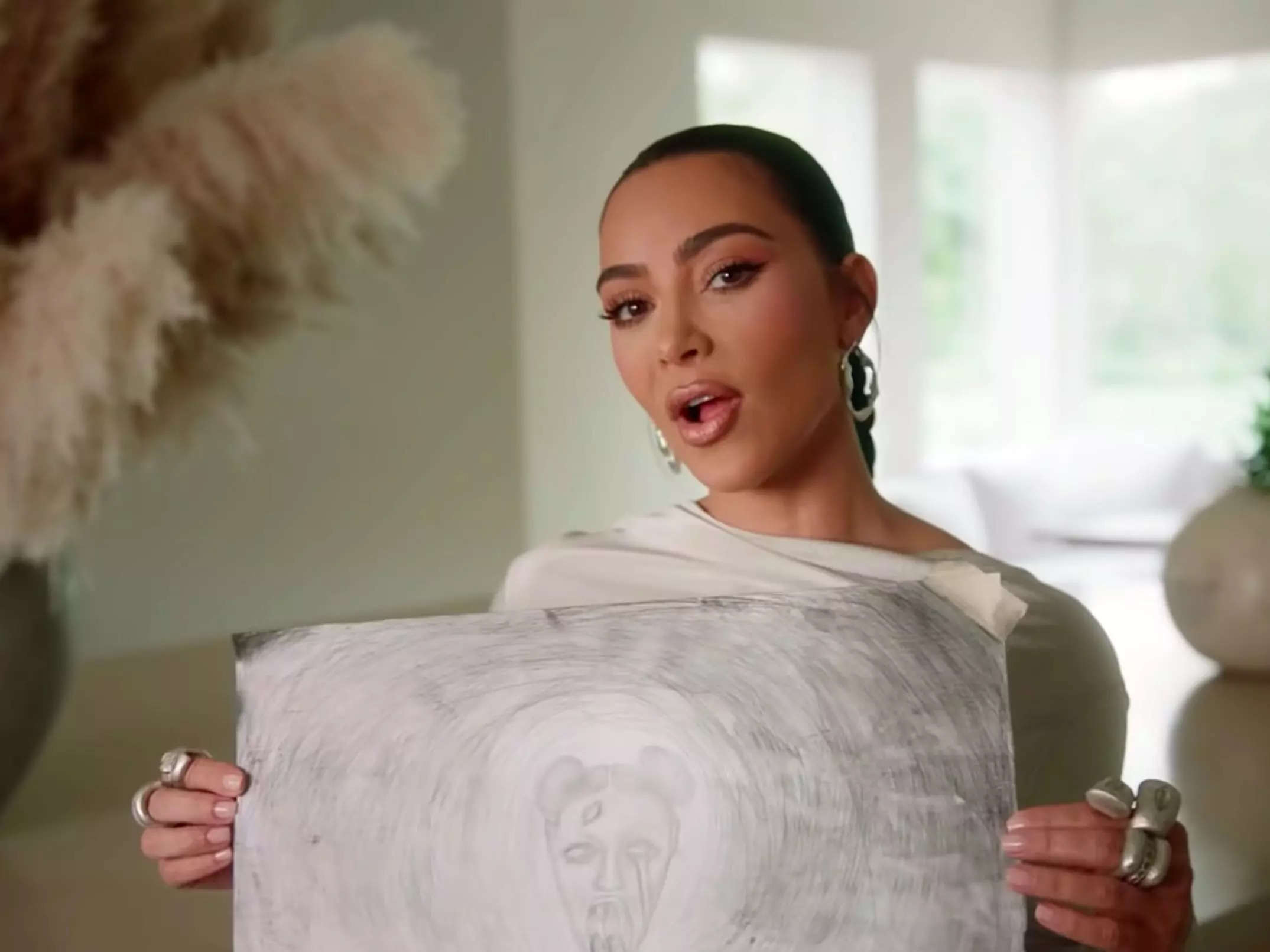 Kim Kardashian shows off a charcoal drawing North West made in