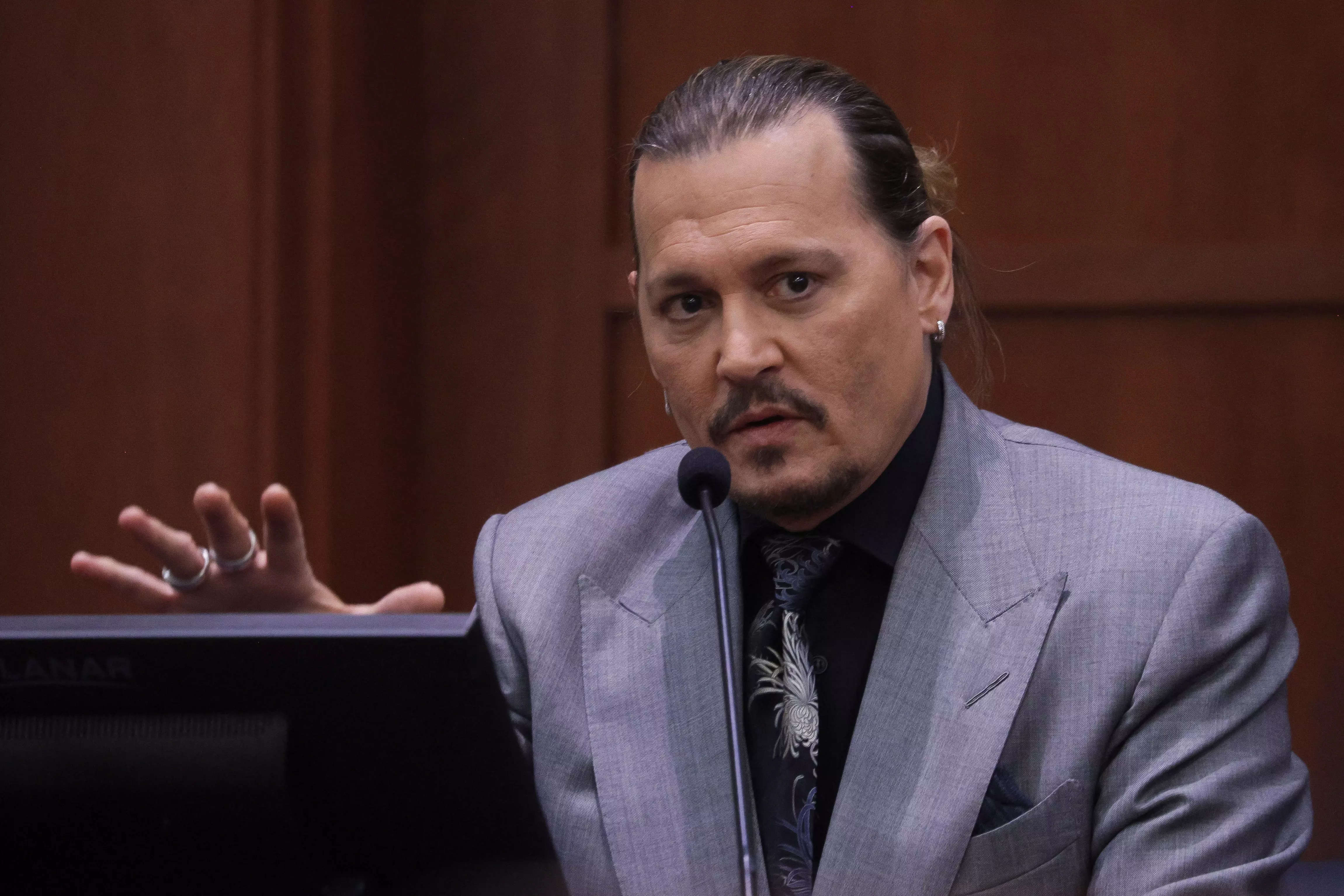 A judge warns Johnny Depp fans to stop laughing during trial or face ...