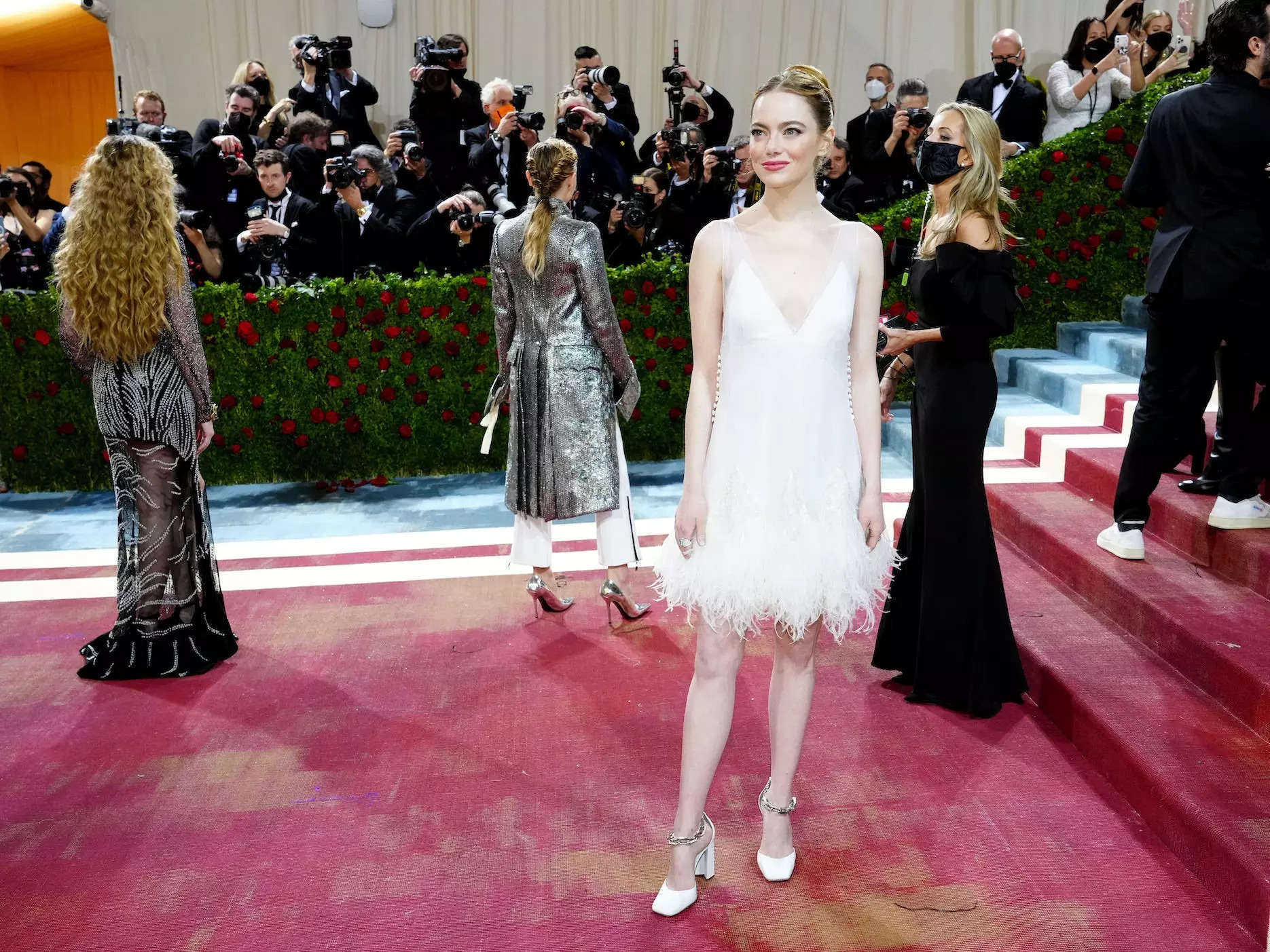 Emma Stone wears black and white for Cruella premiere red carpet