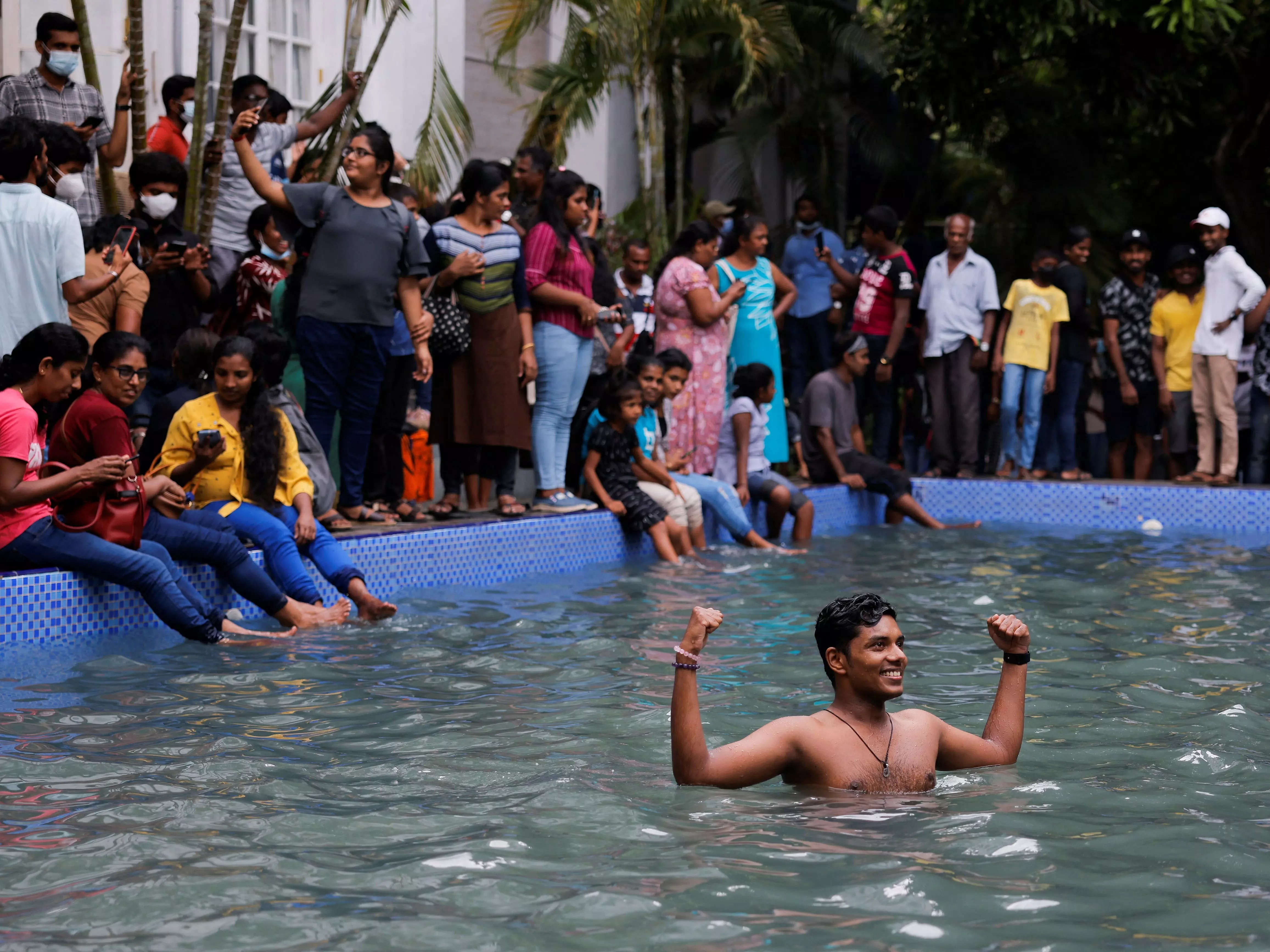 Gasoline shortages, large money owed, and protesters partying within the presidential palace: Here’s what’s occurring in ‘bankrupt’ Sri Lanka