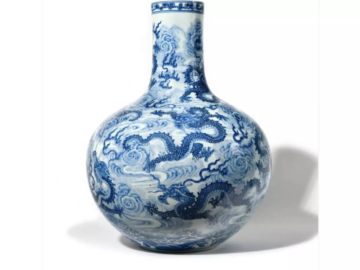 An art expert has been fired after he valued a Chinese vase at $1,950 that sold at auction for nearl