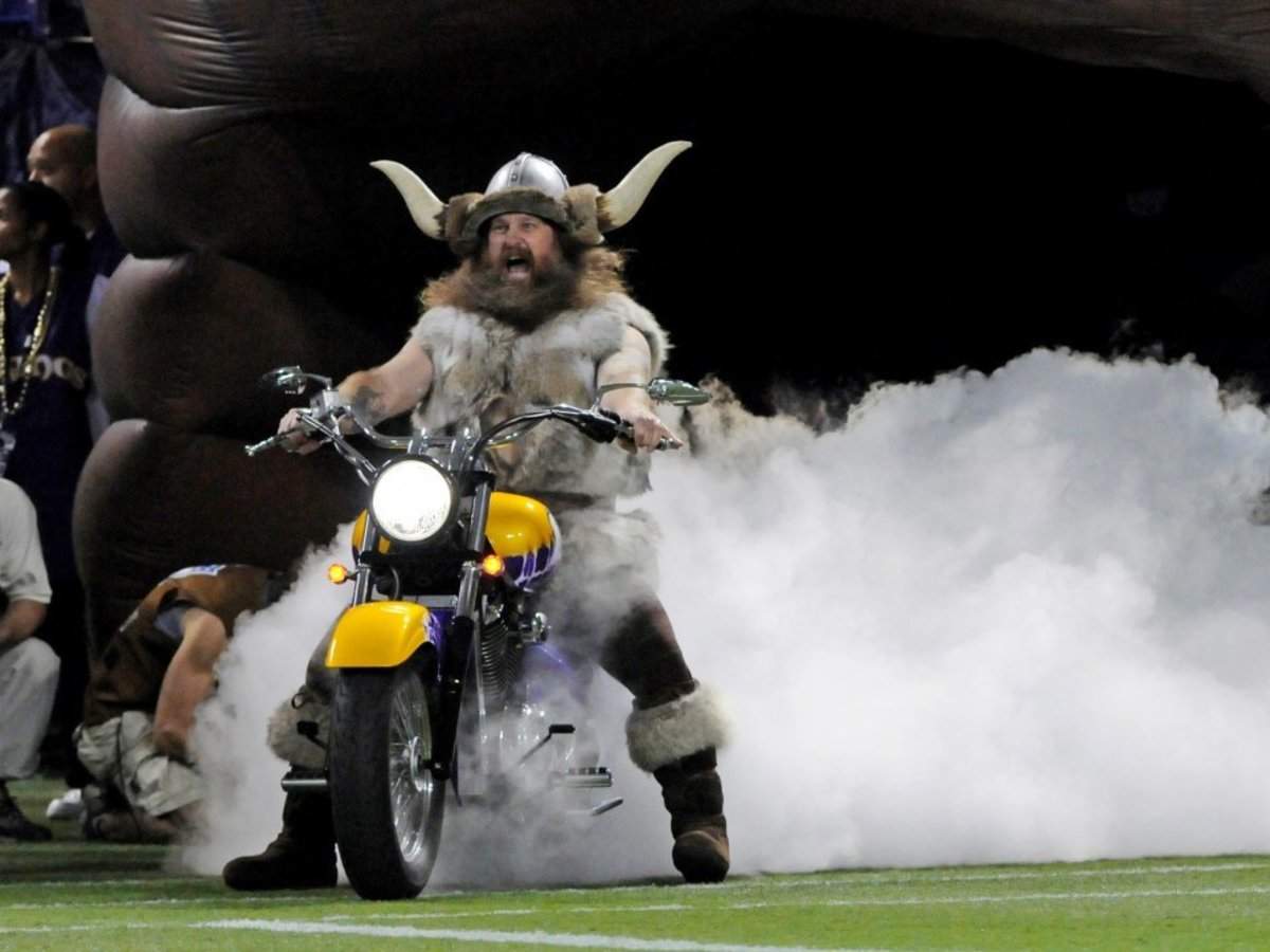 Joseph Juranitch, the Minnesota Vikings mascot Ragnar, rides a