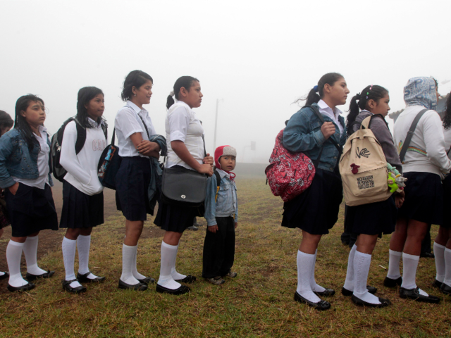 Philippines: Filipino students line up during the first day of school