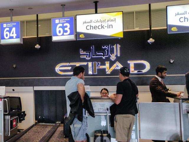 etihad check in baggage weight limit