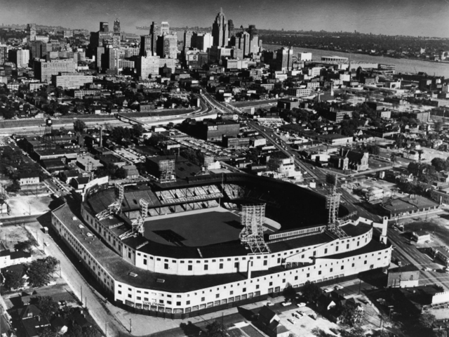 Demolition crews smash the walls of Tiger Stadium, punching